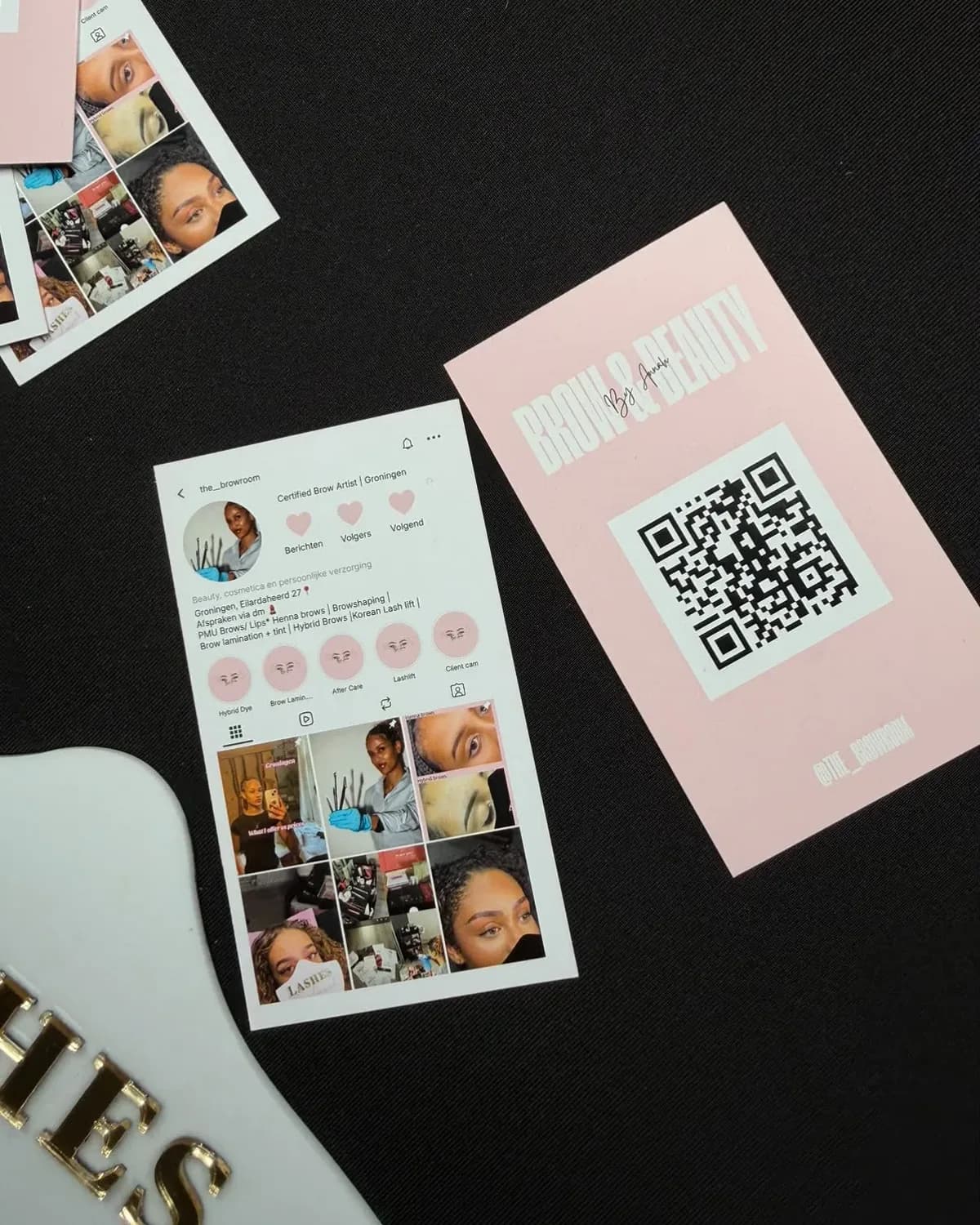 The printed business cards on a black table